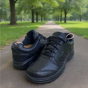 New Balance 812 Black Leather Athletic Sneakers with Subtle Tan Accents